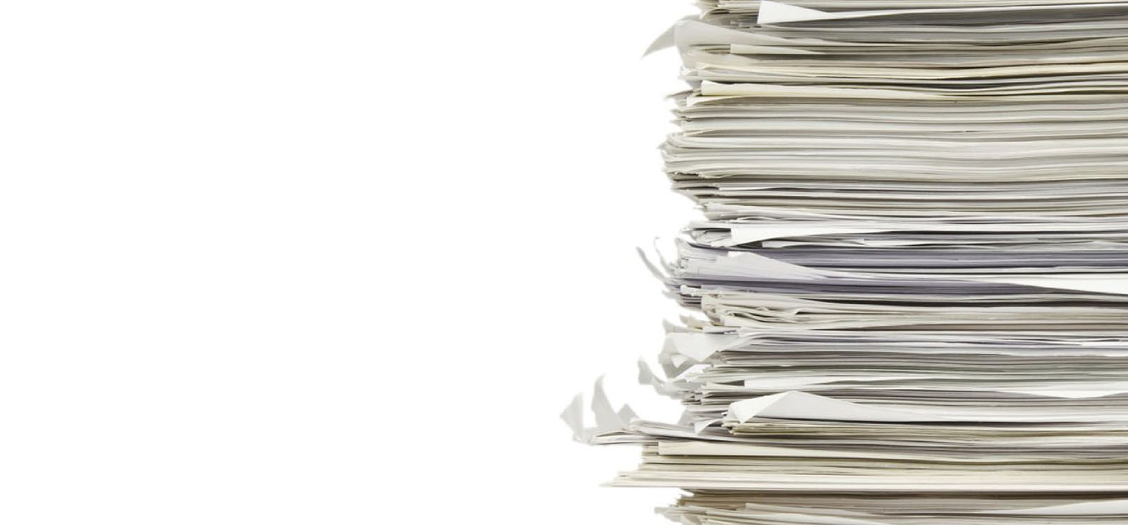 IMAGE: Stack of papers on white background