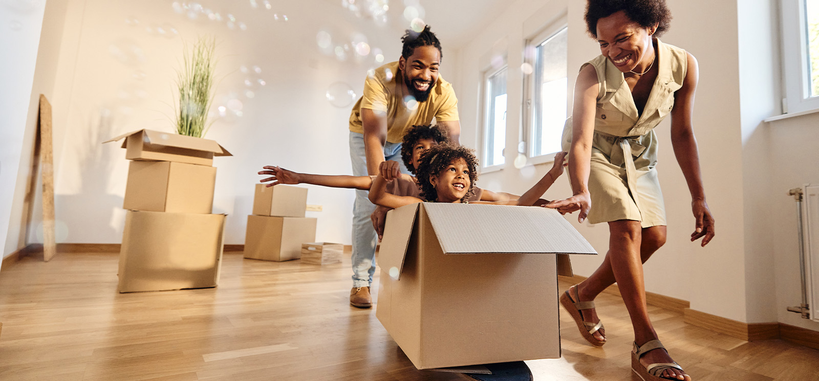 IMAGE: Family moving into a new home
